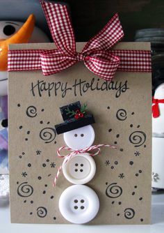 holiday craft with buttons snowman